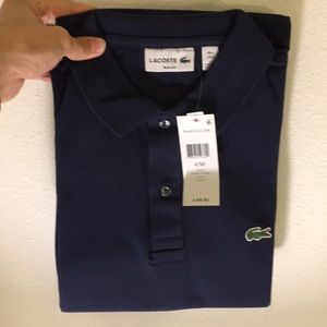 Brand new w/ tags navy Lacoste shirt (size 4 slim)